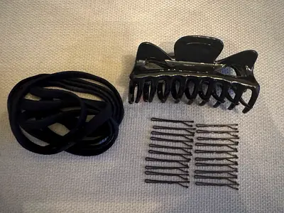Bundle of black hair accessories — 1 claw clip, 4 headbands and 20 new bobby pins