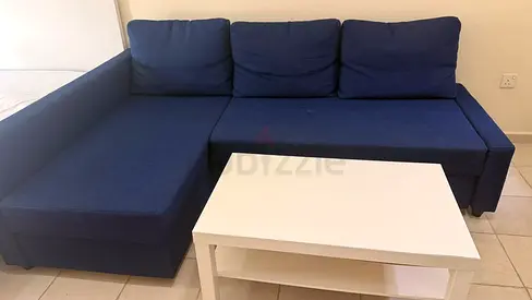 Blue L-shaped Sofa with White Coffee Table - Good Condition