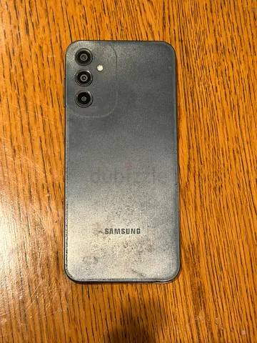 Used Samsung smartphone - rear cameras visible, fair condition