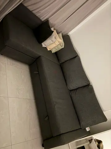 L-shaped dark grey fabric corner sofa — good condition