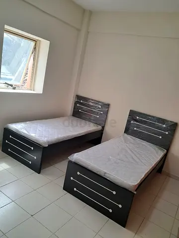 single wood bed