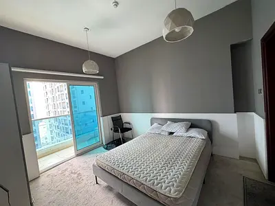 One bedroom and living room for annual rent in City Towers - Al Nuaimiya 3, opposite Grand Mall