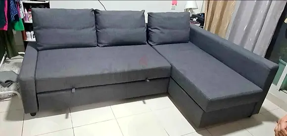 Dark Grey L-shaped Sofa Bed with Storage - Good Condition