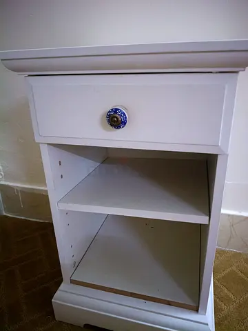 White bedside nightstand with drawer and cubby storage