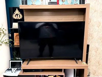 55 inch curved panel TV in good working condition With internet connectivity and remote