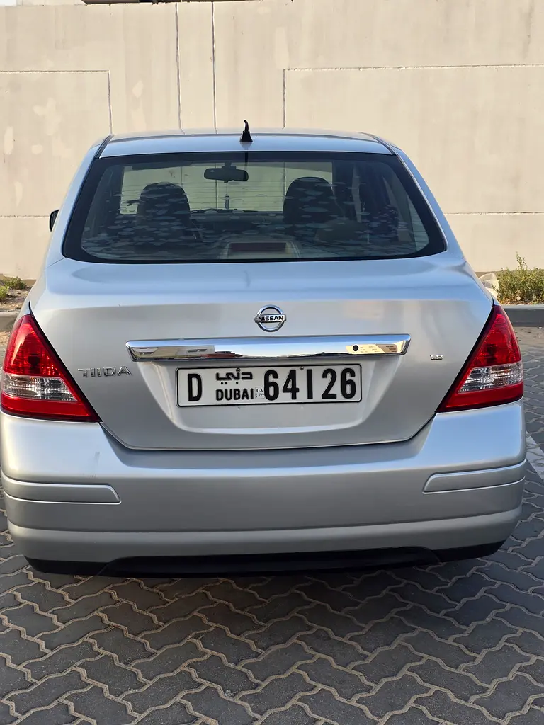 Nissan Tiida 2012 — photo 1 of 6