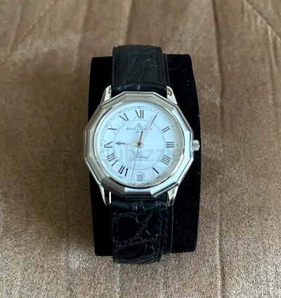 Classic ladies, men watch with folding blue leather clasp signed Baume  Mercier with date