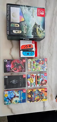 نينتندو سويتش اوليد وملحقاتها  Nintendo Switch OLED and Accessories