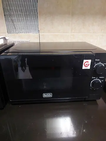 Black countertop microwave oven - good working condition
