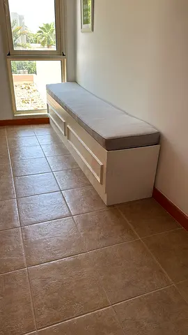 White storage bench with cushion - good condition