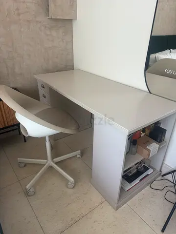 Beige IKEA desk with swivel stool - good condition