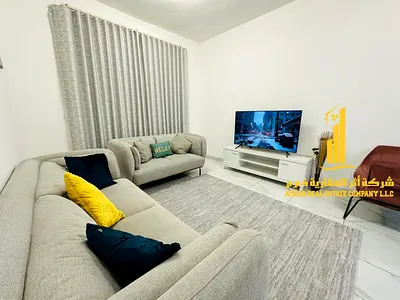 Luxury apartment, second occupancy, two bedrooms, living room, and balcony. Ajman Corniche. For monthly rent.