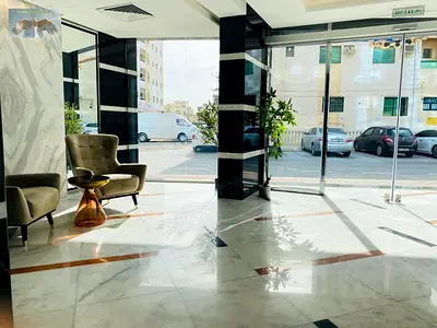 Three bedroom apartment with a living room for annual rent in Al Rawda 1 on the main road close to