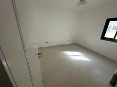 Annual rental apartment in Al Majaz 1, spacious 2BHK with built-in wardrobes, 1 bathroom, free AC, p