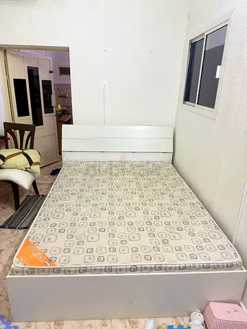 Bed with mattress