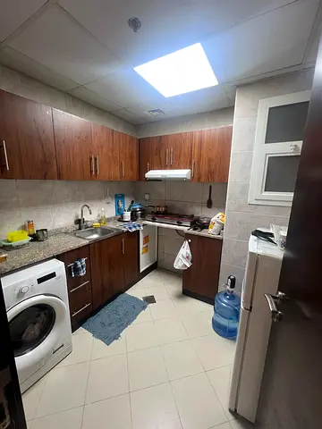 Modern Wooden  Cabinets and , fridge, washing machine, bed
