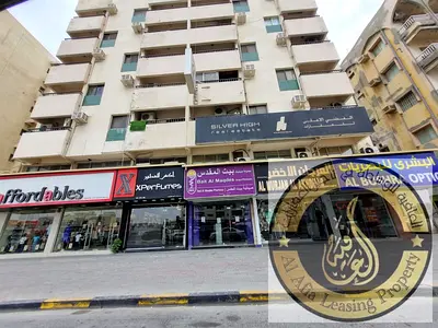 OFFER ON 2 BR HALL APARTMENTS 35K,1 CHEQ 40K,4,6,CHEQS FOR RENT ONLY FOR FAMILY SPILIT/AC NEXT TO PIZZA HUTT ON MAIN AL WAHDA STREET NEAR CITY CENTER