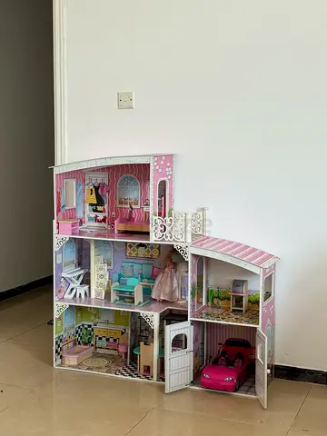 Wooden doll house ( Swap with something the same range)