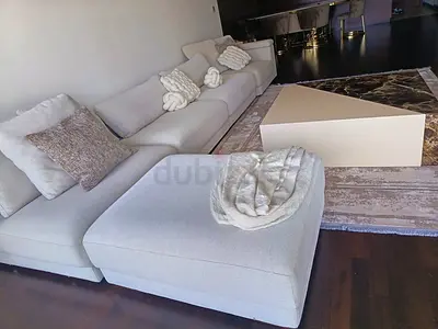 Light Beige Modular Sofa with Ottoman and Accent Cushions