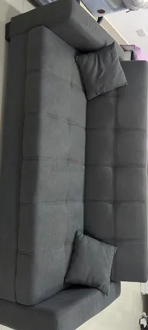 Gray L-shaped Fabric Sofa Bed with Cushions - Good Condition