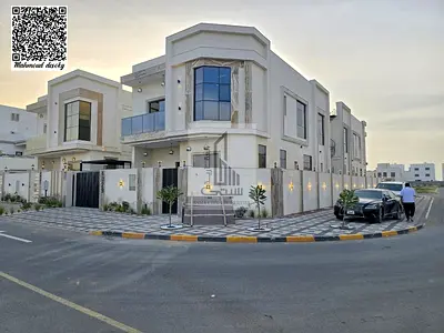 Modern Corner Villa for Sale in Al Zahia, Ajman, with Outdoor Seating Area and Side Garden