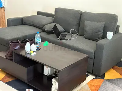 Grey L-shaped Corner Sofa with Cushions and Coffee table- Good Condition
