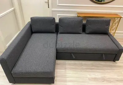 Ikea Gray Friheten L-shaped sofa with storage combed