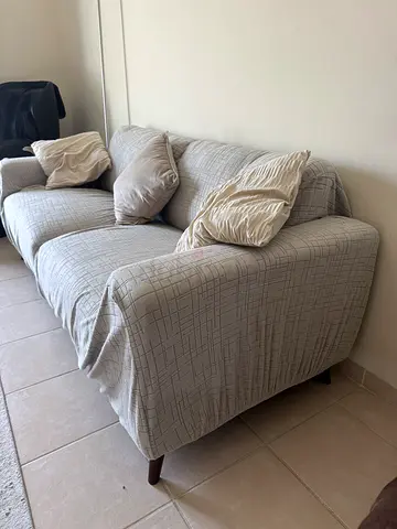 Light grey 2-seater sofa in good condition