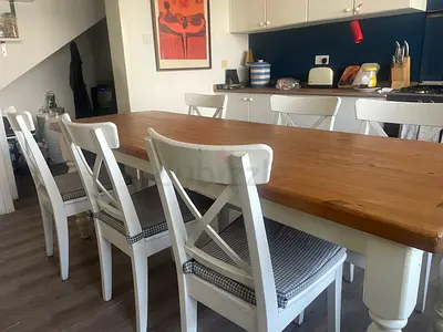 Farm style table + 8 chairs included for sale