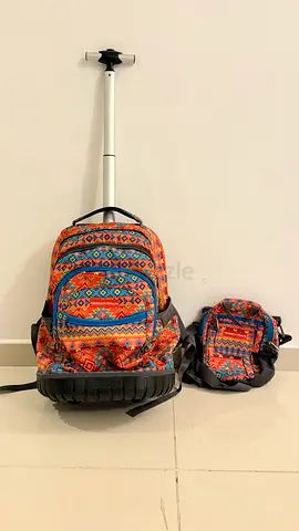 Colorful patterned wheeled backpack with matching lunch bag - good condition 25 aed