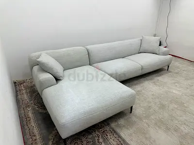 Like new condition the loom collection lshape sofa