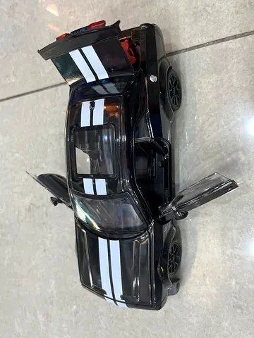 Black Die-Cast Sports Car Toy with Opening Doors and Trunk