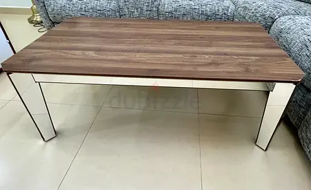 Modern mirrored coffee table with wood-effect top - good condition, bought it for more than 500 AED