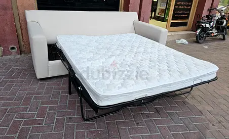 Selling in perfect condition CrateBarral three seater sofa bed with mattress