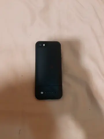 IPhone 5s 64GB with mophie space pack case with 16gb extra storage and battery pack