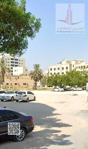 Land for sale in Ajman, Al-Liwara 1, residential/commercial, G+6, area 4888 sq ft, corner on two streets, on Saif Al-Hamrani Main Street. Asking 2.6M