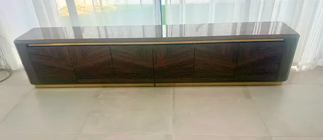 Long low wooden TV console / entertainment unit - dark finish