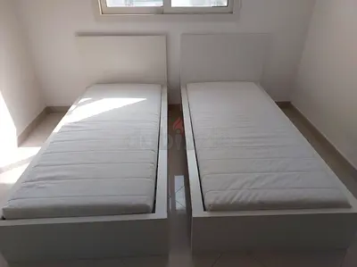 2 Pieces Ikea malm single bed with 2 ikea mattress like new