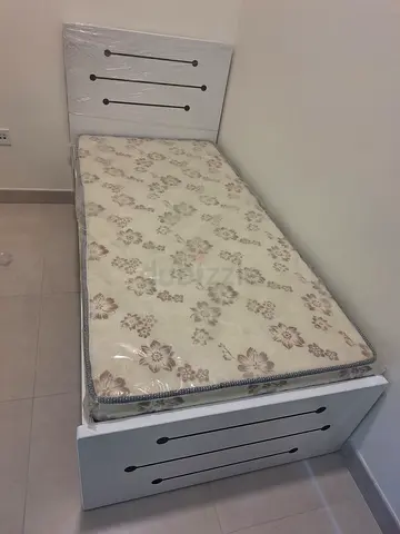 BRAND NEW SINGLE BED WITH MATTRESS AVAILABLE