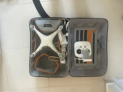 DJI Phantom 4 with Carrying Case and Controller - Good Condition