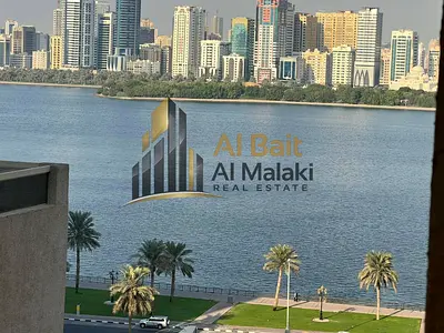 The most beautiful 2-bedroom apartment with a living room in Al Majaz 3 featuring an American-style kitchen
