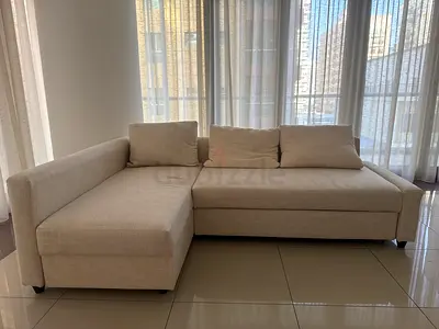 Beige L-shaped Sofa with Chaise - Good Condition