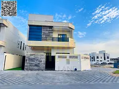 Corner villa for sale in Ajman | 5 master bedrooms + roof terrace | Large setback | Close to the mos