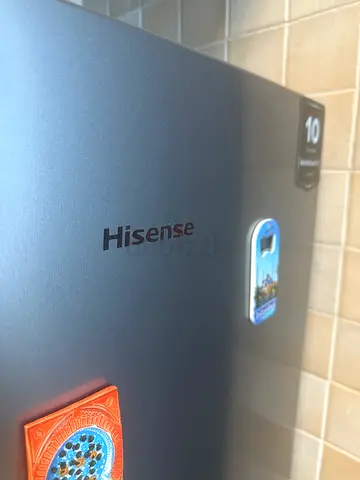 Hisense silver Refrigerator - good condition (with a dent during moving)
