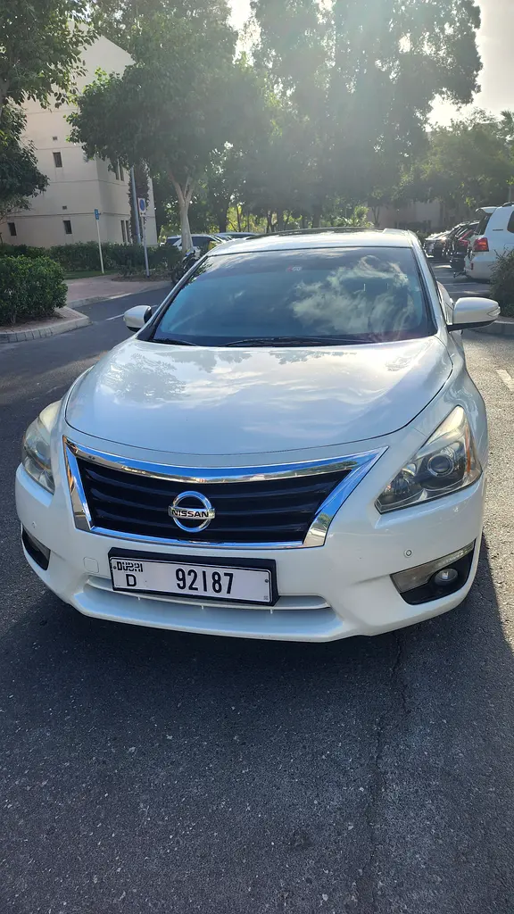 Nissan Altima 2014 — photo 1 of 12