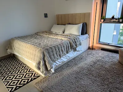 Queen upholstered bed frame with headboard - beige