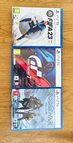 Bundle: FIFA 23, Gran Turismo 7  $% of War (PS5) - Like New