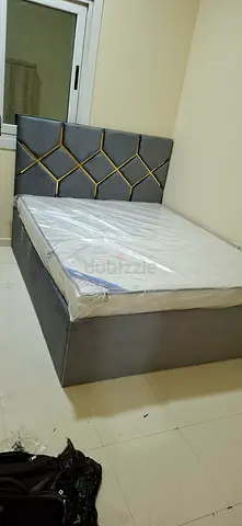 Brand new queen size bed with mattress
