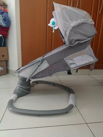 Baby rocker/seat with canopy and hanging toys - good condition