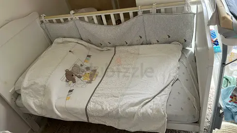 White wooden baby crib with bedding set (used) with mat in very good condition